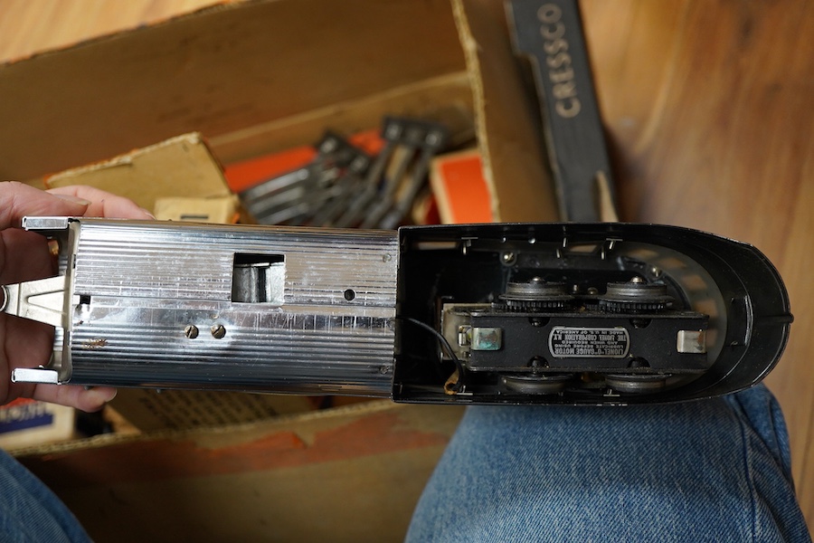 A boxed Lionel 0 gauge ‘Flying Yankee’ train set, comprising of a streamlined articulated diesel locomotive No.616, and three articulated chrome bogie cars; two No.617 and an observation car No.618, together with a boxed